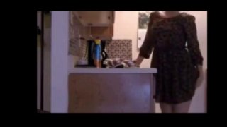 Housewife Arina masturbates in the kitchen